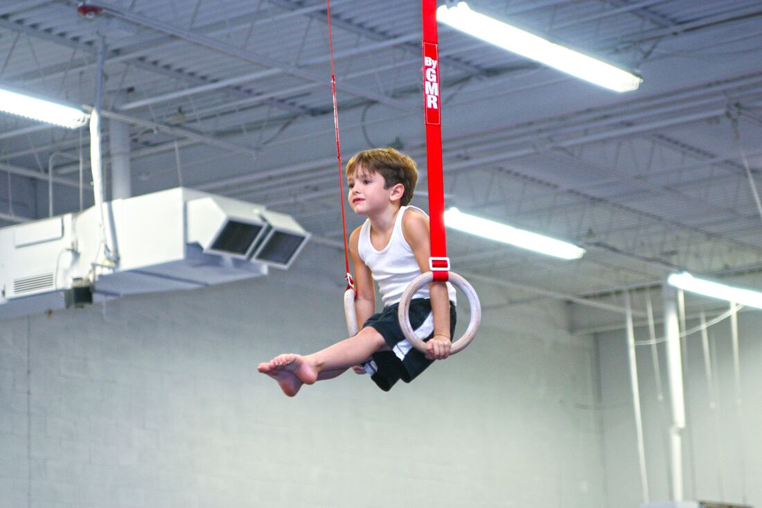 Boy on the rings